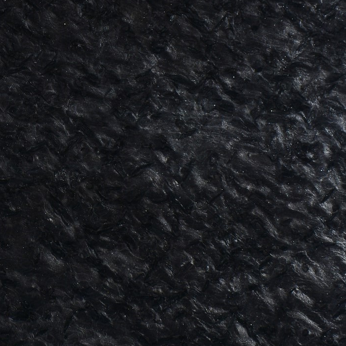 granito-matrix Granito Matrix de piedra natural con fondo negro y textura mineral homogénea, ideal para mesadas, revestimientos y proyectos de arquitectura e interiorismo.