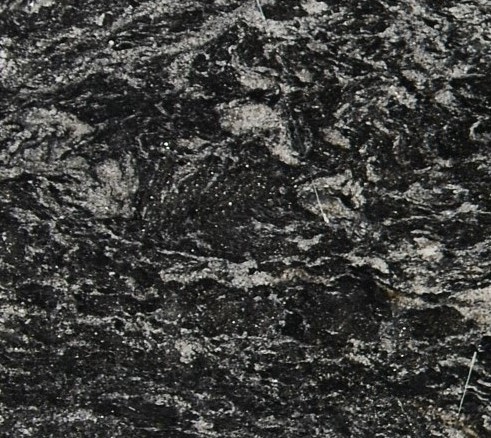 www.PicStone.com.br Granito Negro Boreal de piedra natural con fondo negro y vetas grises, ideal para mesadas, revestimientos y proyectos de arquitectura e interiorismo.