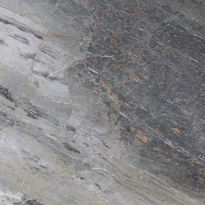 marmol-deep-grey Mármol Deep Grey natural con fondo gris y expresivas vetas marrones, blancas y grises, ideal para mesadas de baño, revestimientos y proyectos de interiorismo.