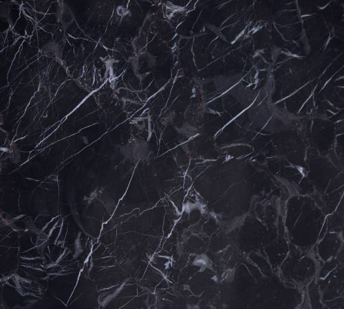 marmol-desert-brown Mármol Desert Brown natural de color marrón oscuro con vetas avellana y reflejos dorados, ideal para revestimientos, mesadas de baño, mesadas de vanitory y proyectos de interiorismo elegante.