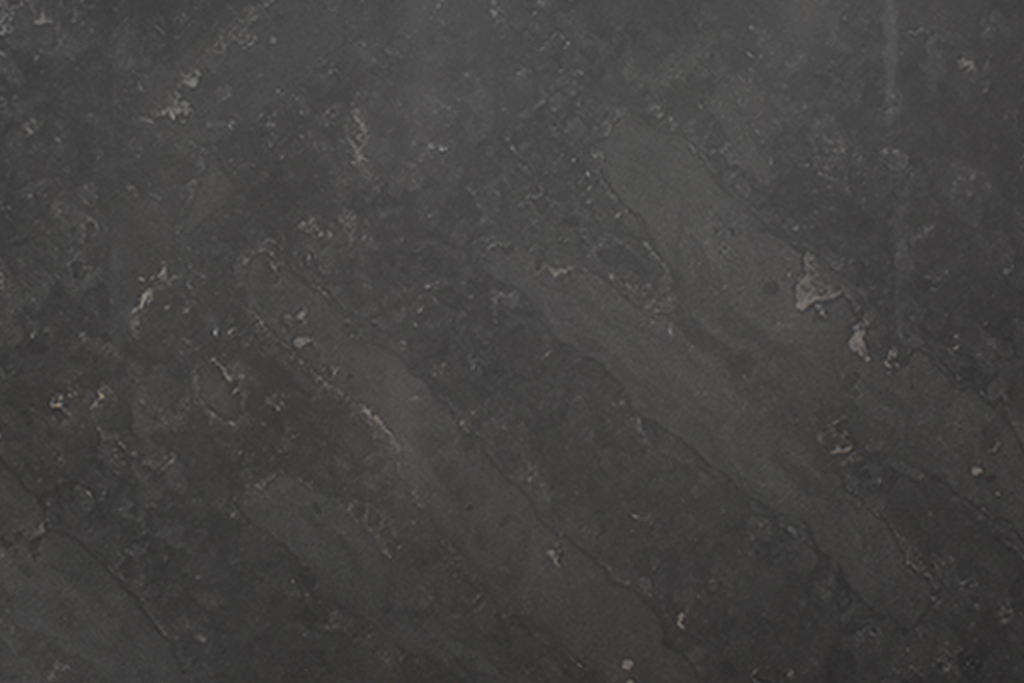 marmol-pietra-davola Mármol Pietra D'Avola natural de fondo gris oscuro con vetas sutiles, ideal para revestimientos, mesadas de baño y proyectos de interiorismo contemporáneo.