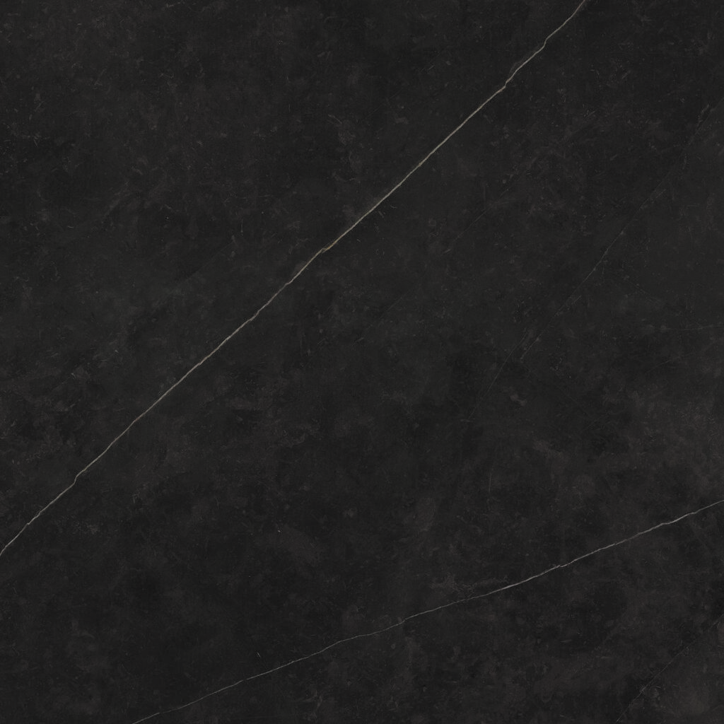 neolith-calatorao-piedra-sinterizada Neolith Calatorao, piedra sinterizada de fondo gris oscuro con finas vetas doradas, ideal para mesadas y revestimientos.
