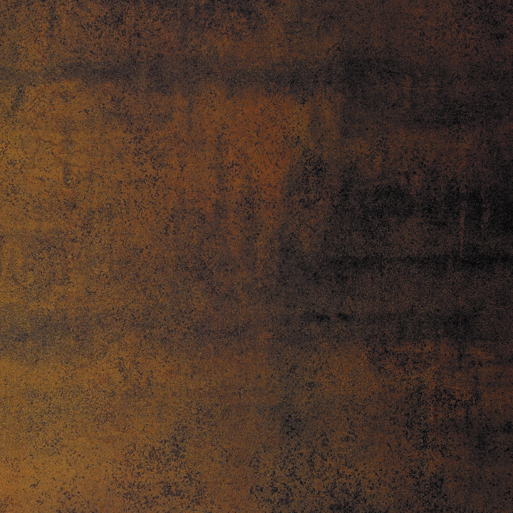 Neolith Iron Corten, piedra sinterizada en tonos marrones y cobrizos inspirada en el acero corten, ideal para mesadas y revestimientos.
