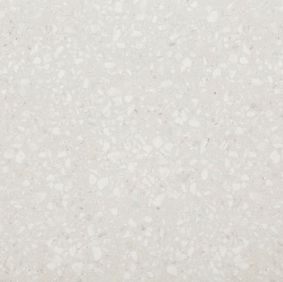 Neolith Retrostone, piedra sinterizada de fondo claro con efecto de grano inspirado en el terrazo tradicional, ideal para mesadas y revestimientos.