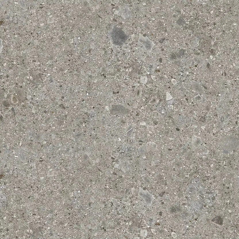 purastone-prima-ceppo-di-gre Purastone Prima Ceppo di Gre, superficie sinterizada de fondo gris con fragmentos minerales, ideal para mesadas, islas, revestimientos y proyectos de interior y exterio