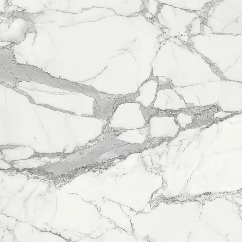 purastone-pura-estatuario-venato Purastone Pura Estatuario Venato de cuarzo con fondo blanco y veteado gris profundo, ideal para mesadas, islas y revestimientos interiores.