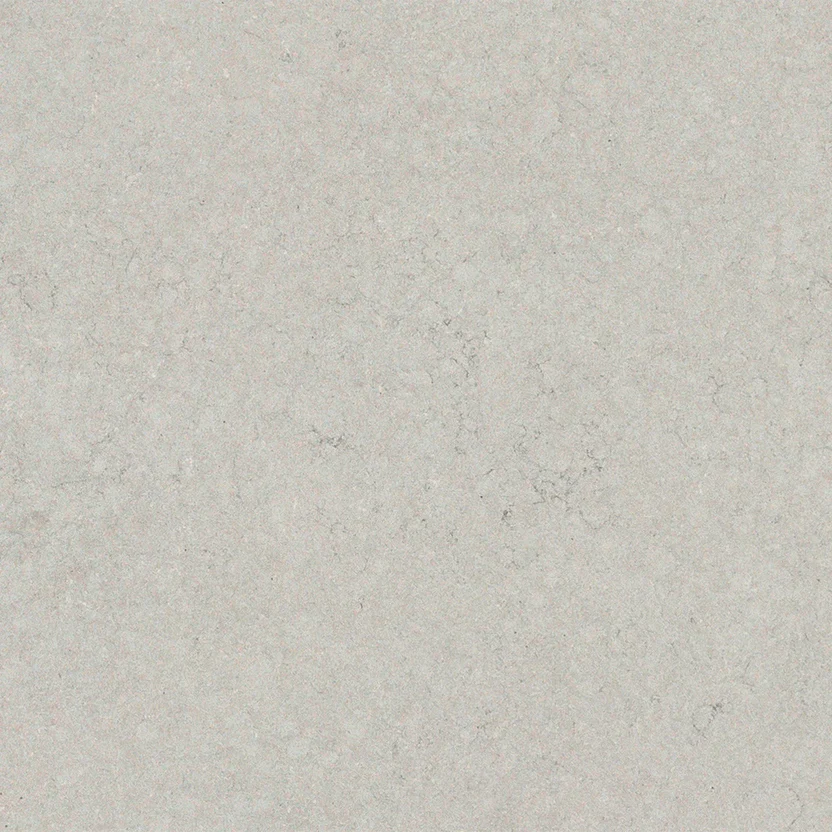 purastone-pura-gris-fosil Purastone Pura Gris Fosil de cuarzo en tono gris claro con textura sutil y apariencia uniforme, ideal para mesadas, islas, mesas y revestimientos interiores.