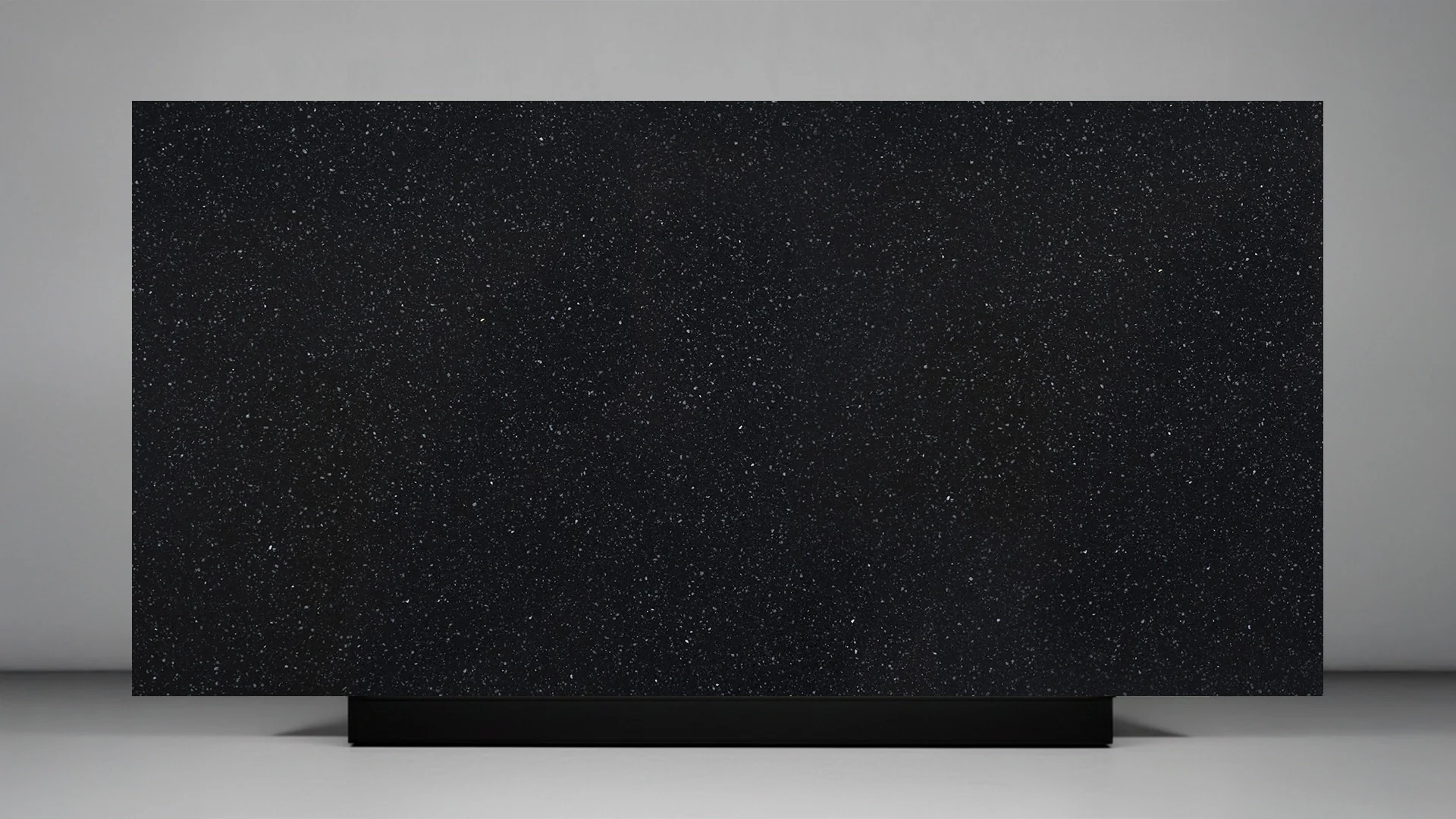 purastone-pura-negro-betun-chapa-completa Purastone Pura Negro Betún de cuarzo con color negro intenso y textura granular fina, ideal para mesadas, islas y revestimientos interiores.