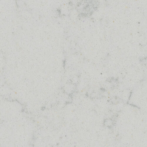 Terrazo Lotus con base blanca, granulometría fina y sutiles matices grises, ideal para baños, mesas, pisos y revestimientos.
